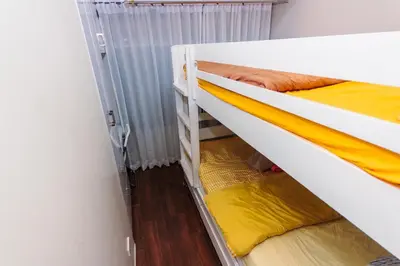 a small room with two bunk beds in it at Beauty Cindrella Home Makati Penthouse 3 Bedroom in Manila