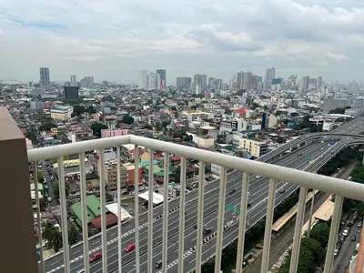 a view of a city with traffic on a highway at 2301 Jazz View Condo in Manila