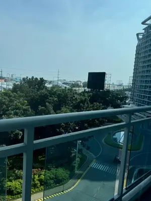 a view from the balcony of a building at Azure Urban Dream Staycation in Manila