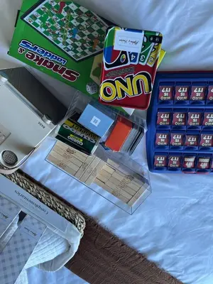 a table topped with boxes of candy and other snacks at Alphas Haven in Manila
