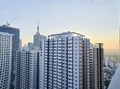 a view of a large city with tall buildings at 1BR Condotel with Balcony at FAME Residences #FM59 in Manila