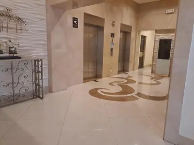 a lobby with a large snake carpet on the floor at 1 Bedroom unit near NAIA T3 in Manila