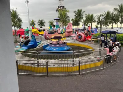 a water park with a water slide and a roller coaster at Shore Family Suite 2 Beds WiFi TV Netflix Near MOA 9120 in Manila