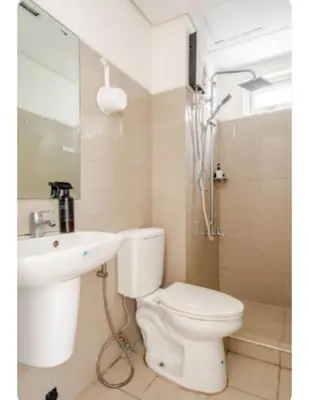 a bathroom with a toilet and a sink and a shower at Sosyal Staycation , Pasay City Shore Residences Tower D Sunrise Drive Mall of Asia Complex Pasay City Philippines SMDC SHORE 1 RESIDENCES Pasay City in Manila