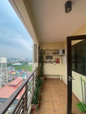 a view from the balcony of a apartment at Raya Garden Vacation Home 2 bedroom sunset view in Manila