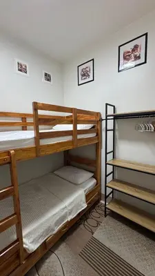 two bunk beds are in a room with at 2BR Unit in SMDC Shore 3 with pool access in Manila