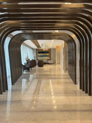 a hallway in a building with a lobby at 2BR Unit in SMDC Shore 3 with pool access in Manila