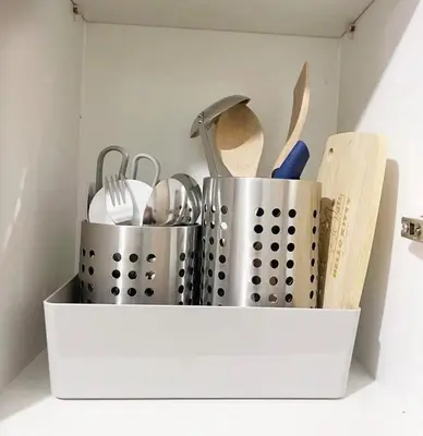 a white container filled with utensils on a shelf at 19106 Condotel at Shore 2 MOA wNetflix in Manila