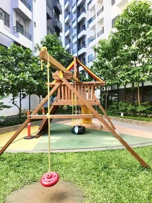 a playground in a park with a play structure at SM HOME Spring Residences Staycation and Condotel in Manila