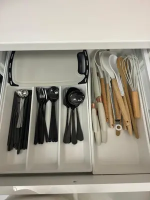 a drawer filled with lots of cooking utensils at Chic and Cozy Minimalist Condo with Pool in Makati City in Manila