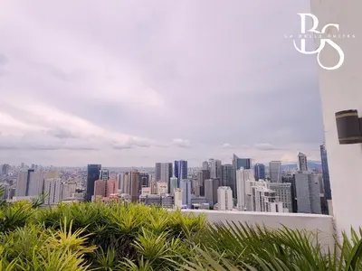 a view of a city skyline from a building at The Beacon Makati New Renovated Studio Ayala Greenbelt CBD Makati PH in Manila