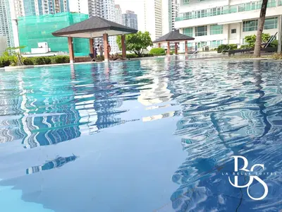 a swimming pool in the middle of a building at The Beacon Makati New Renovated Studio Ayala Greenbelt CBD Makati PH in Manila
