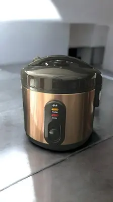 a slow cooker sitting on a kitchen counter at Condo in Las Piñas- The Suite Spot Alabang in Manila