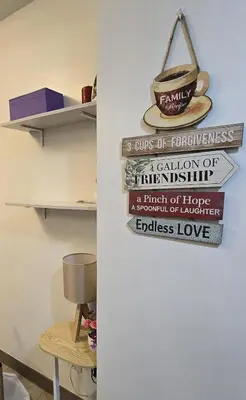a group of signs hanging on a wall at Urban Resort luxury Staycation at Azure Residences Rio Tower in Manila
