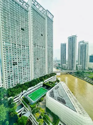 an aerial view of a city with tall buildings at Hotel Residences near Makati in Manila