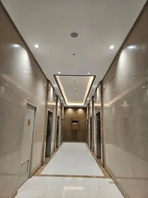 a hallway of a building with a hallwayngth at Luxury Apartment at Park Mckinley West suite 2 in Manila
