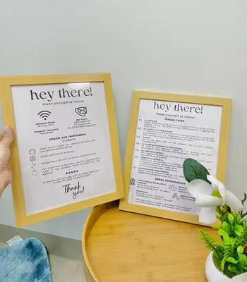 two menu boards on a table with a plant at Ocean Room 677 Shore 2 Tower 3 MOA Complex, Pasay City in Manila