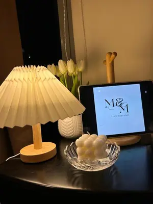 a desk with a laptop computer and a mushroom on it at M&M Azure Staycation Parañaque in Manila