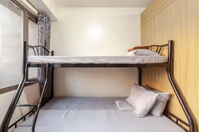 a couple of bunk beds in a room at Shore Residences Tower D - 2 Bunkbed Ideal for 6 guests in Manila