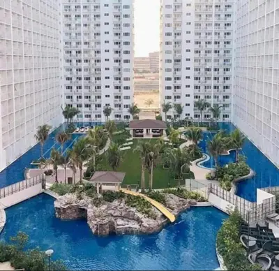 a view of a resort with a water park at BIG CUT, END UNIT in SHORE RESIDENCES in Manila