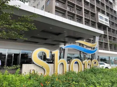 a sign in front of a building at BIG CUT, END UNIT in SHORE RESIDENCES in Manila