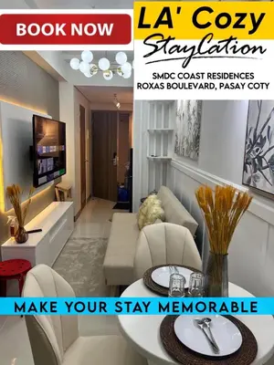a magazine advertisement for aluxury living room at Flat in Pasay-Coast Residences in Manila
