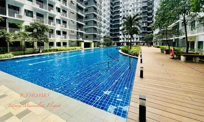 a swimming pool in the middle of a building at EJ Homes - Shore 3 Residences in Manila