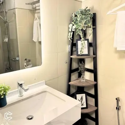 a bathroom with a sink and a mirror at Crib2Go Benz Suite with Pool View in Manila