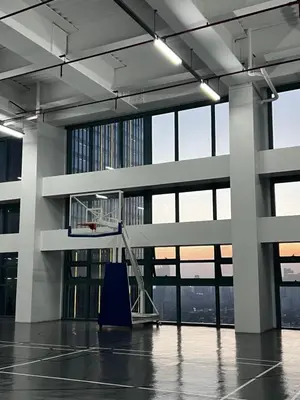 an empty room with a basketball hoop in a building at Affordable 1BR Staycation at One Uptown BGC in Manila