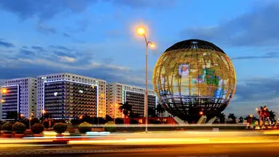 a large ball in front of a city at night at Great Stay in Manila in Manila