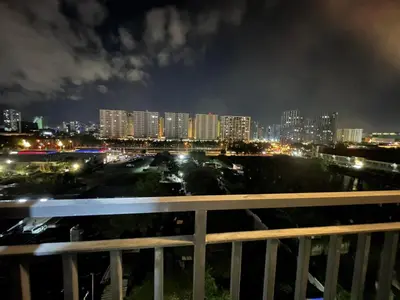 a view of a city at night with buildings at Shore 2 Family Suite 2 Beds Balcony City View WiFi Netflix MOA 735 in Manila