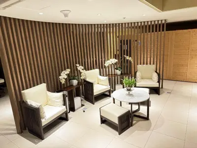 a waiting room with chairs and a table at Eastwood Global Plaza Luxury 1Bed Room with 2 Toilets and Laundry Room in Manila
