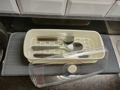 a tray of utensils sitting in a drawer at Casa Florentino in Manila