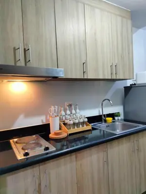 a kitchen with a sink and a counter top at SMDC StayWise Space in Manila