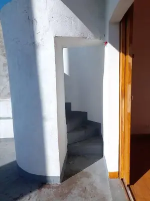a stairway in a building with a stair case at Taguig Apartment Near ARCA South in Manila
