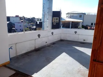 a view of a balcony of a building at Taguig Apartment Near ARCA South in Manila
