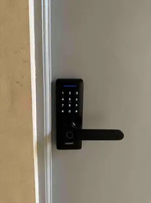 a door with a remote control on the door at Lawton Residences Studio Room 2H in Manila