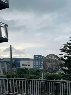 two metal spheres in front of a building at Adrianne Condotel at Shell Residences Condominium, MOA Complex, Pasay City in Manila