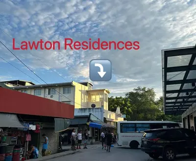 a sign that says lenovo reserves on top of a building at Lawton Residences Studio Room 3F - 4pax in Manila