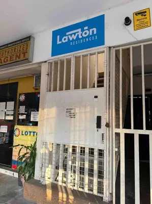 a store front with a sign that reads leniton appliances at Lawton Residences Studio Room 3G in Manila