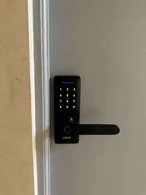 a door with a black door handle on a white door at Lawton Residences Studio Room 3J in Manila