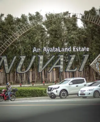 a sign for an ayala land estate in malaysia at A Scandinavian-inspired studio in Silang in Bayabasan
