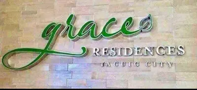 a sign for at VM Staycation Grace Residence Taguig in Manila