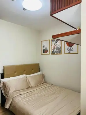a bedroom with a bed in a room at HIGHLY RECOMMENDED La Nooq MNL - Cozy 1BR Skyline view in Mandaluyong in Manila