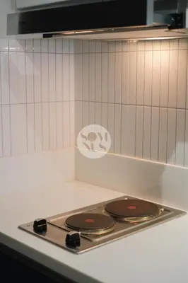 a stove top with two burners on top of it at Somnus Suites at Air Residences in Manila
