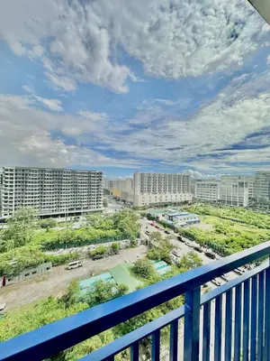 a view of a city from a balcony at Cozy Beit 1125 in Metro Manila in Manila