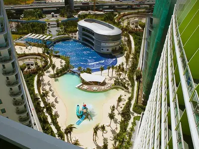 an aerial view of a resort with a swimming pool at Azure Urban Residences by Lyn in Manila