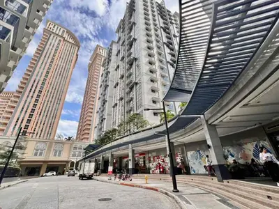 a view of a city with tall buildings at Heart of BGC McKinley B3 in Manila