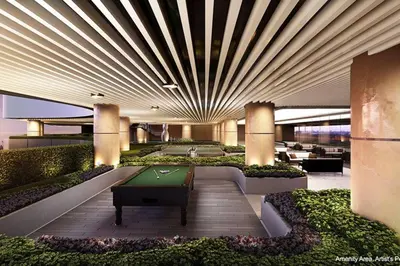 a pool table in the middle of a building at Air Residences 43rdF -By Soliel in Manila