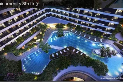an overhead view of a large apartment building with a pool at Air Residences 43rdF -By Soliel in Manila
